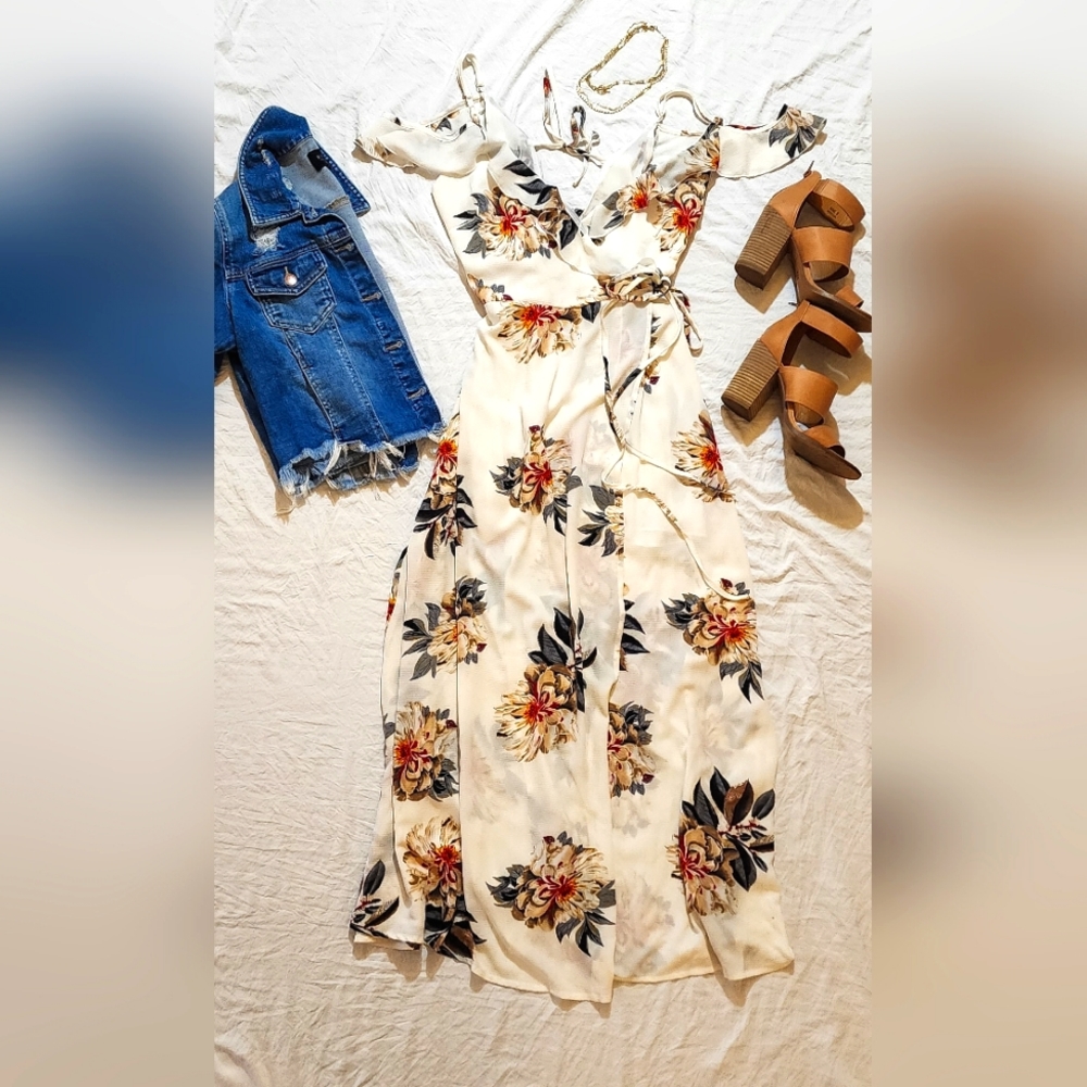Floral maxi wrap dress.  Strap and ruffle cold shoulder strap detail.  Size M